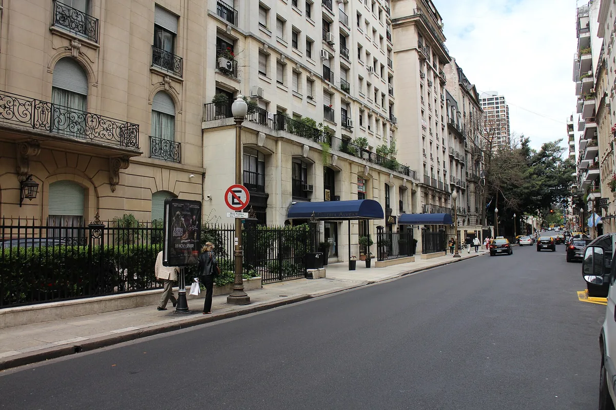 Tree-lined Avenida Alvear with elegant buildings in Recoleta, Buenos Aires